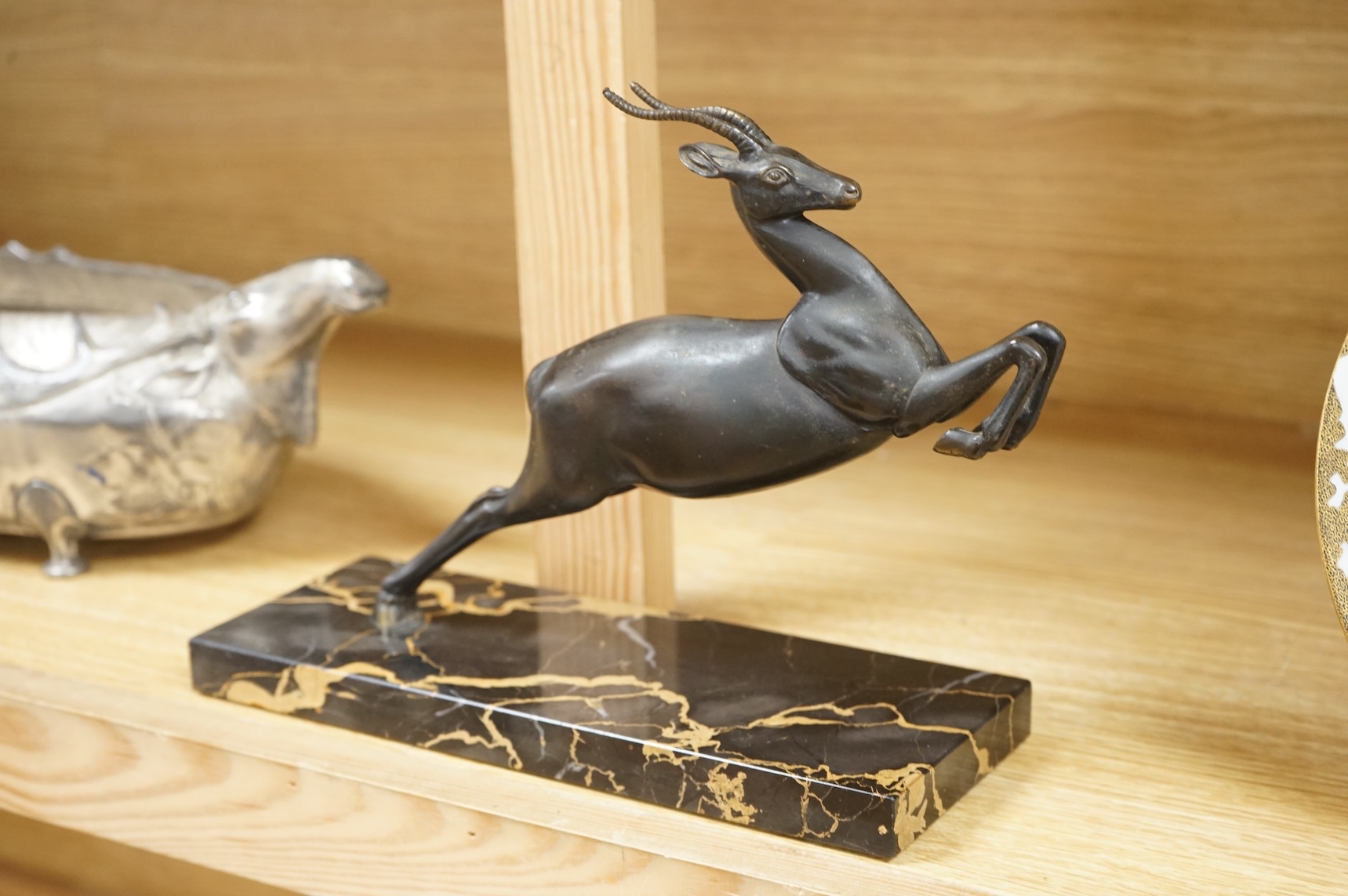 A Kayserzinn Versilbert ‘moose’ centrepiece with presentation inscription dated 1907, 47cm wide